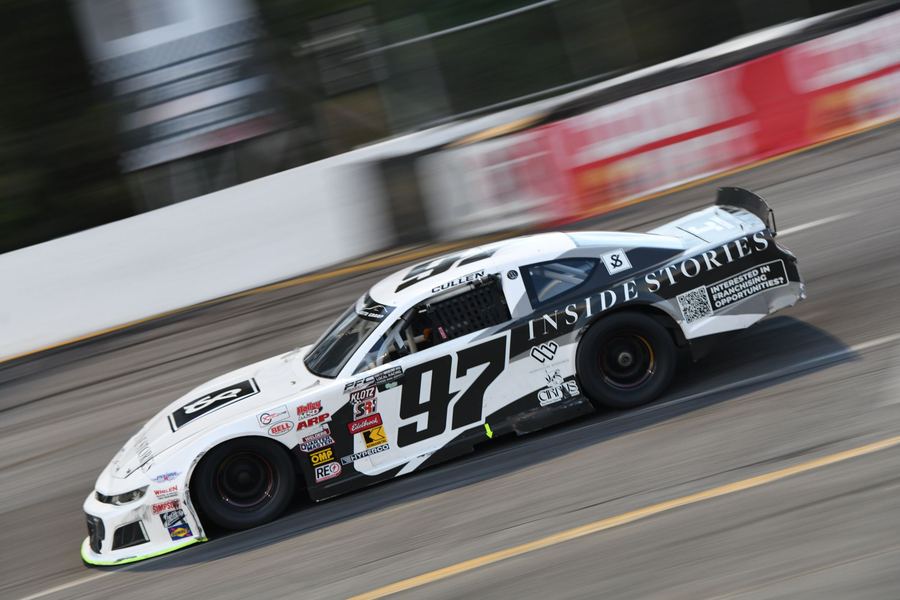 The #97 Inside Stories car at speed